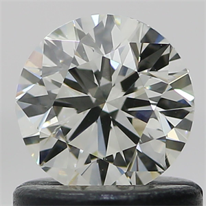 Picture of Natural Diamond 0.71 Carats, Round with Very Good Cut, L Color, SI1 Clarity and Certified by GIA