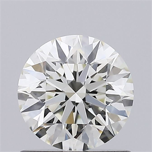 Picture of Natural Diamond 0.72 Carats, Round with Excellent Cut, K Color, VVS1 Clarity and Certified by GIA
