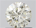 Natural Diamond 0.70 Carats, Round with Excellent Cut, K Color, VVS1 Clarity and Certified by IGI