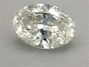 Picture of Natural Diamond 0.90 Carats, Oval with  Cut, H Color, SI2 Clarity and Certified by GIA