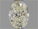 Natural Diamond 0.74 Carats, Oval with  Cut, K Color, SI1 Clarity and Certified by IGI