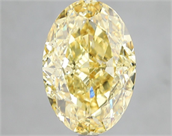 Picture of Lab Grown Diamond 5.04 Carats, Oval with  Cut, Fancy Vivid Yellow Color, VS2 Clarity and Certified by IGI