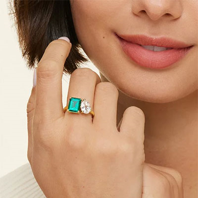 Toi Et Moi engagement ring setting includes 1 carat green lab emerald gem, choose 1ct pear or any other shape