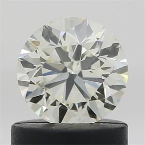 Foto Diamante Natural 0.71 quilates, Redondo , Color M, claridad VVS2 y certificado HRD de