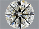 Natural Diamond 0.71 Carats, Round with Very Good Cut, L Color, SI1 Clarity and Certified by GIA