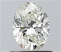 Natural Diamond 0.60 Carats, Oval with  Cut, J Color, VVS1 Clarity and Certified by IGI