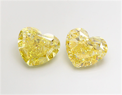 Picture of Lab Grown Diamond 10.02 Carats, Heart with  Cut, Fancy Vivid Yellow Color, VVS2 Clarity and Certified by IGI