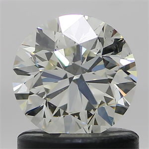 Picture of Natural Diamond 0.90 Carats, Round with Very Good Cut, L Color, VS2 Clarity and Certified by GIA