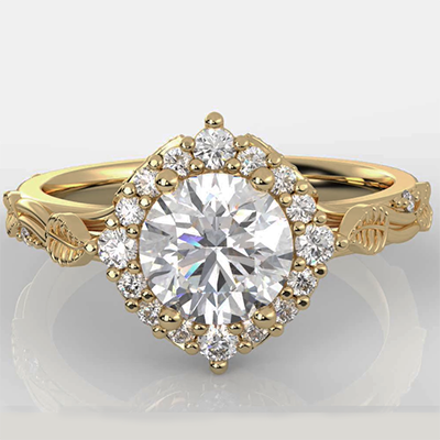 Leaf motif vintage engagement ring with side diamonds