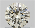 Natural Diamond 0.70 Carats, Round with Excellent Cut, K Color, VS1 Clarity and Certified by IGI