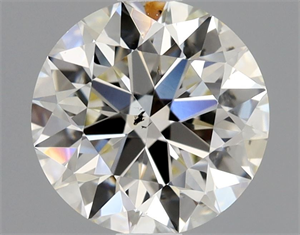 Picture of Natural Diamond 0.90 Carats, Round with Excellent Cut, K Color, SI2 Clarity and Certified by GIA