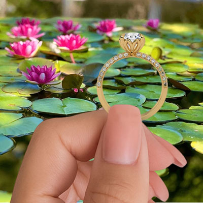The Lotus Engagement ring setting with 0.36 Ct sides