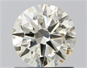 Natural Diamond 0.90 Carats, Round with Excellent Cut, K Color, VS2 Clarity and Certified by IGI