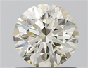 Natural Diamond 0.90 Carats, Round with Excellent Cut, J Color, SI1 Clarity and Certified by IGI