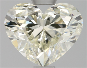 Picture of Natural Diamond 0.90 Carats, Heart with  Cut, L Color, SI2 Clarity and Certified by HRD