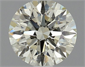 Natural Diamond 0.90 Carats, Round with Excellent Cut, K Color, VS2 Clarity and Certified by IGI
