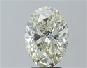 Natural Diamond 3.01 Carats, Oval with  Cut, K Color, SI2 Clarity and Certified by IGI