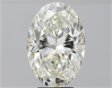 Natural Diamond 5.07 Carats, Oval with  Cut, K Color, SI1 Clarity and Certified by GIA