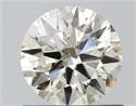 Natural Diamond 0.71 Carats, Round with Excellent Cut, J Color, IF Clarity and Certified by IGI