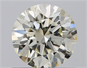 Natural Diamond 0.70 Carats, Round with Excellent Cut, M Color, SI1 Clarity and Certified by GIA