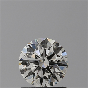 Picture of Natural Diamond 0.90 Carats, Round with Excellent Cut, K Color, VVS1 Clarity and Certified by GIA