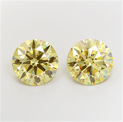 Picture of Lab Grown Diamond 5.07 Carats, Round with Ideal Cut, Fancy Yellow Color, VS2 Clarity and Certified by IGI