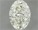 Natural Diamond 0.90 Carats, Oval with  Cut, M Color, SI2 Clarity and Certified by GIA