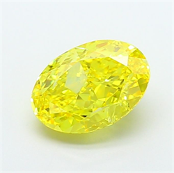 Picture of Lab Grown Diamond 3.11 Carats, Oval with  Cut, Fancy Vivid Yellow Color, VVS2 Clarity and Certified by IGI