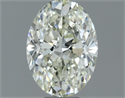 Natural Diamond 0.90 Carats, Oval with  Cut, K Color, SI1 Clarity and Certified by IGI