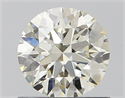 Natural Diamond 0.73 Carats, Round with Excellent Cut, K Color, VVS1 Clarity and Certified by IGI