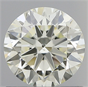 Natural Diamond 0.90 Carats, Round with Excellent Cut, K Color, VS2 Clarity and Certified by IGI