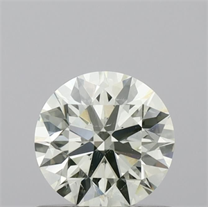 Picture of Natural Diamond 0.71 Carats, Round with Excellent Cut, J Color, SI1 Clarity and Certified by IGI