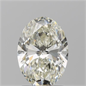 Natural Diamond 1.70 Carats, Oval with  Cut, K Color, SI1 Clarity and Certified by GIA
