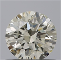 Natural Diamond 0.60 Carats, Round with Excellent Cut, M Color, SI1 Clarity and Certified by GIA