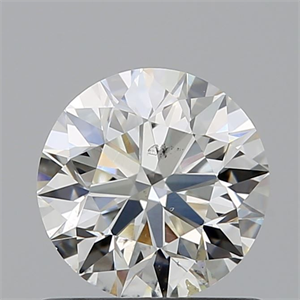 Picture of Natural Diamond 0.90 Carats, Round with Excellent Cut, J Color, SI1 Clarity and Certified by GIA