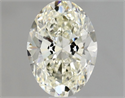 Natural Diamond 0.90 Carats, Oval with  Cut, K Color, VVS1 Clarity and Certified by GIA