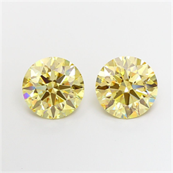 Picture of Lab Grown Diamond 5.02 Carats, Round with Ideal Cut, Fancy Light Yellow Color, VS1 Clarity and Certified by IGI