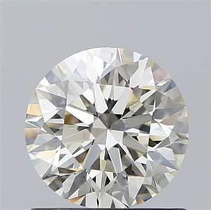 Picture of Natural Diamond 0.90 Carats, Round with Excellent Cut, J Color, SI1 Clarity and Certified by GIA