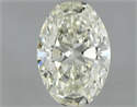 Natural Diamond 0.72 Carats, Oval with  Cut, K Color, VVS1 Clarity and Certified by IGI