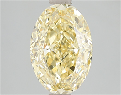 Picture of Lab Grown Diamond 3.11 Carats, Oval with  Cut, Fancy Vivid Yellow Color, VVS2 Clarity and Certified by IGI