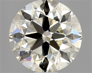 Foto Diamante Natural 0.90 quilates, Redondo , Color M, claridad VVS1 y certificado GIA de