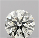 Natural Diamond 0.72 Carats, Round with Excellent Cut, M Color, VVS2 Clarity and Certified by IGI