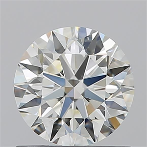Picture of Natural Diamond 0.90 Carats, Round with Excellent Cut, K Color, VS2 Clarity and Certified by GIA