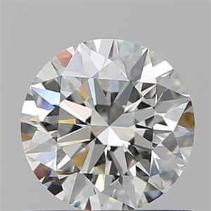Picture of Natural Diamond 0.90 Carats, Round with Excellent Cut, J Color, VVS1 Clarity and Certified by GIA