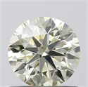 0.72 Carats, Round with Excellent Cut, N Color, VVS1 Clarity and Certified by GIA