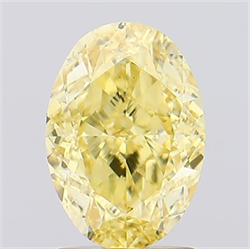 Picture of Lab Created Diamond 2.10 Carats, Oval with  Cut, Fancy Vivid Yellow Color, VS2 Clarity and Certified by IGI
