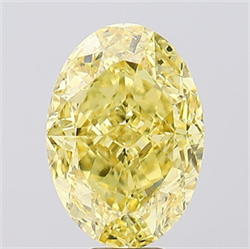 Picture of Lab Created Diamond 12.03 Carats, Oval with  Cut, Fancy Vivid Yellow Color, VS1 Clarity and Certified by IGI